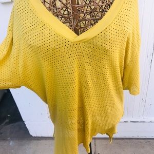 Yellow Free People Movement shirt.